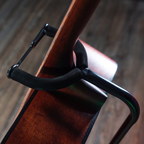 closeup of acoustic guitar on Stageline stand